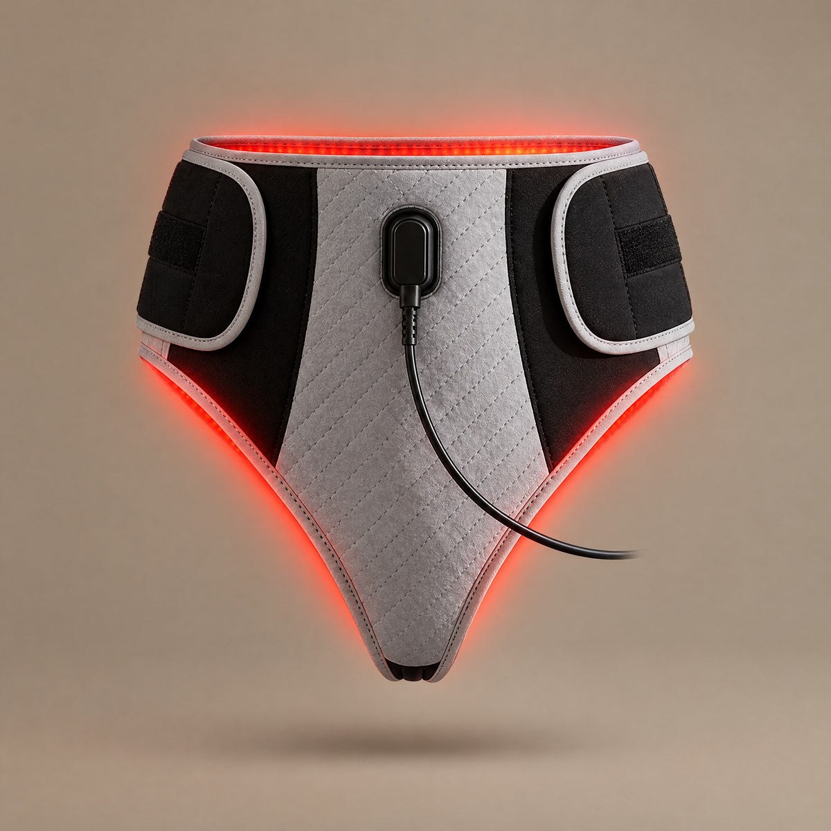 BellyBear wrap switched on, red light glowing from inside